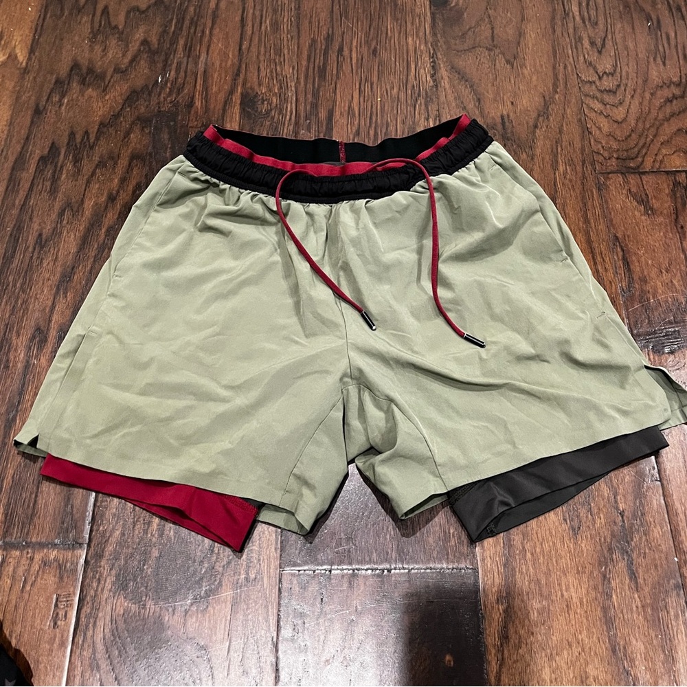 Chubbies Olive Green Athletic Shorts with Black and Red Accents